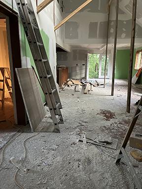 Living and dining area during rough construction